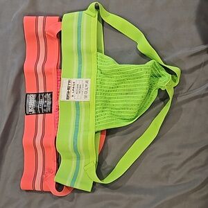 2 jockstraps pink is L and green is XL